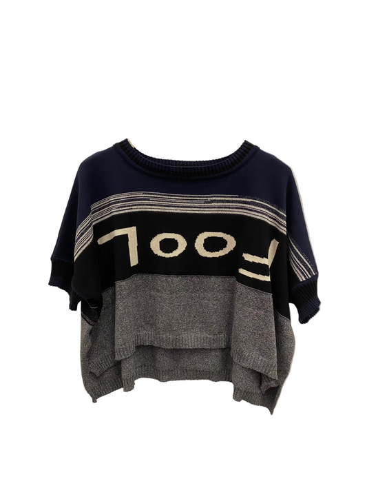 Navy, black and grey marled stripe body with upside down FOOL font on front of knit top.