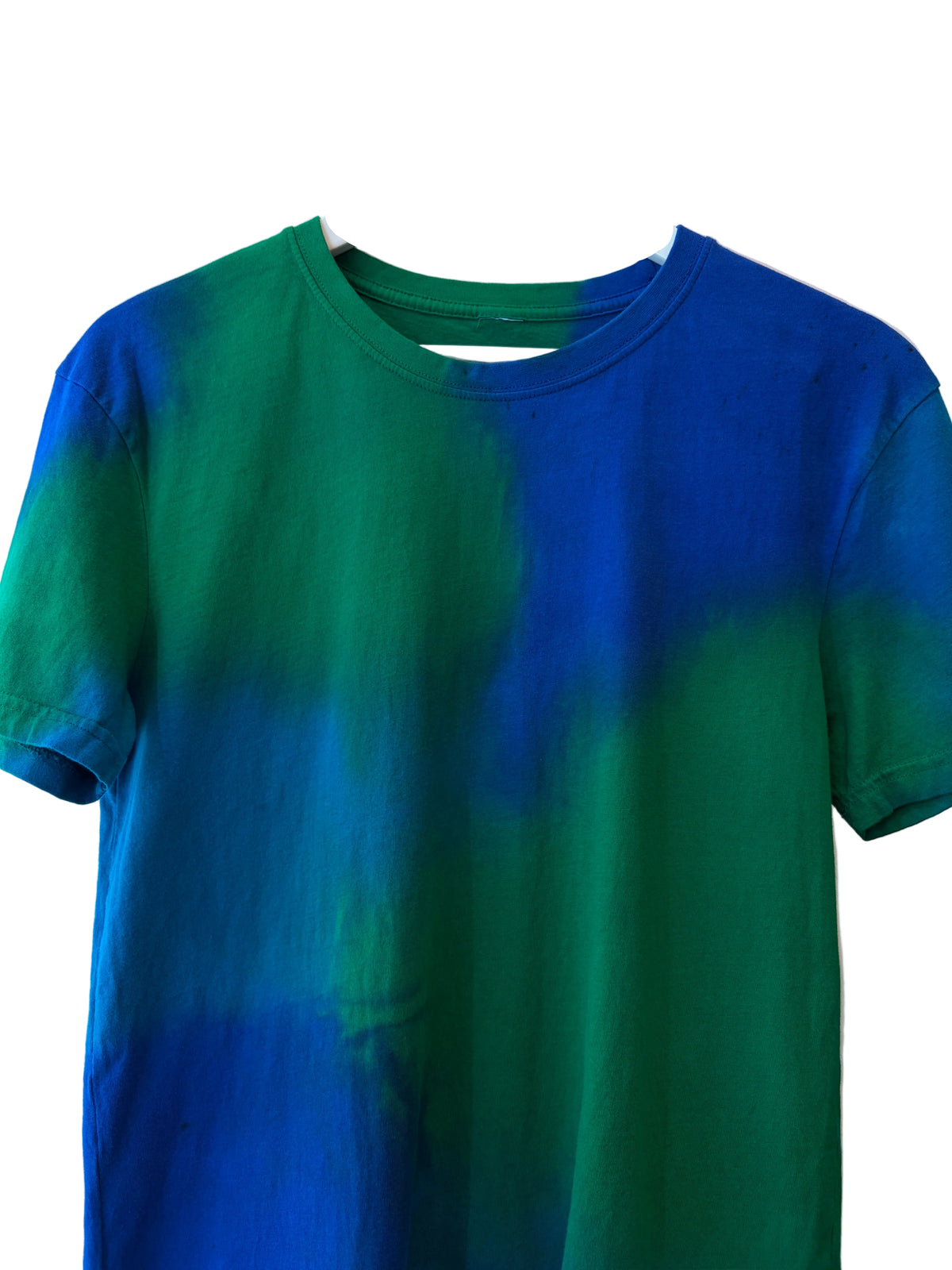 A short-sleeve crewneck t-shirt with a green and blue tie-dye pattern
